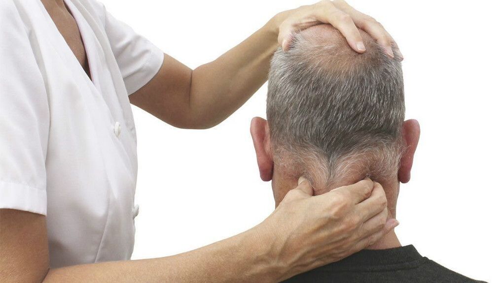 Performing a therapeutic neck massage.